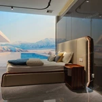 Soft Beige Upholstered Bed with Natural Wood Veneer Trim & Integrated Ambient Lighting